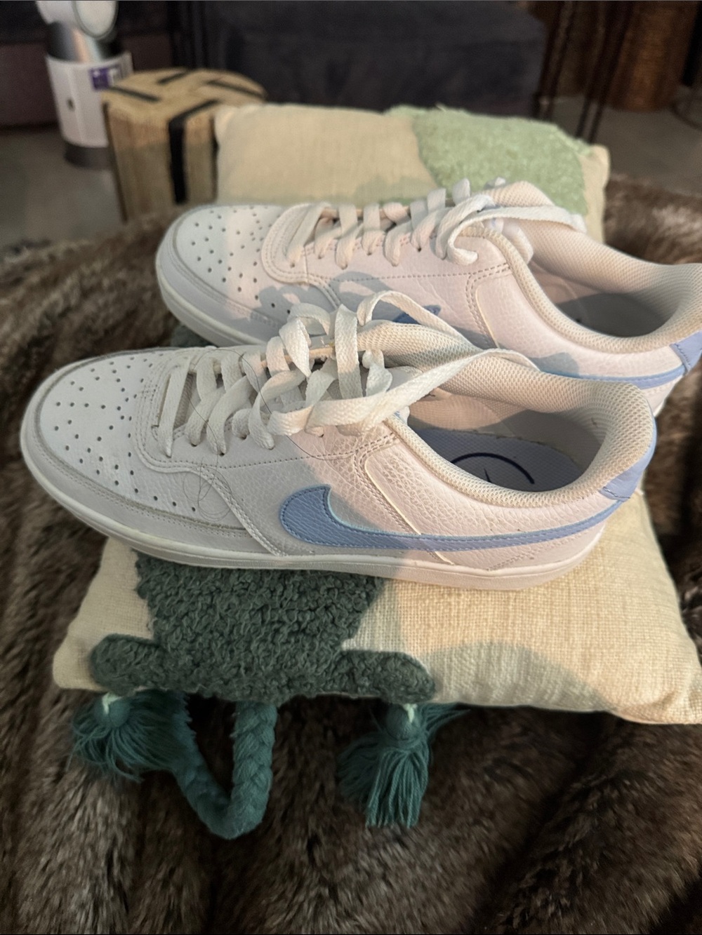 Nike White Low-Top Sneakers with Light Blue Swoosh